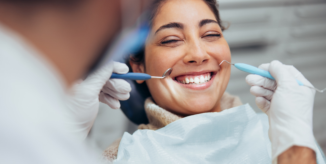 Woman smiling during dental checkup