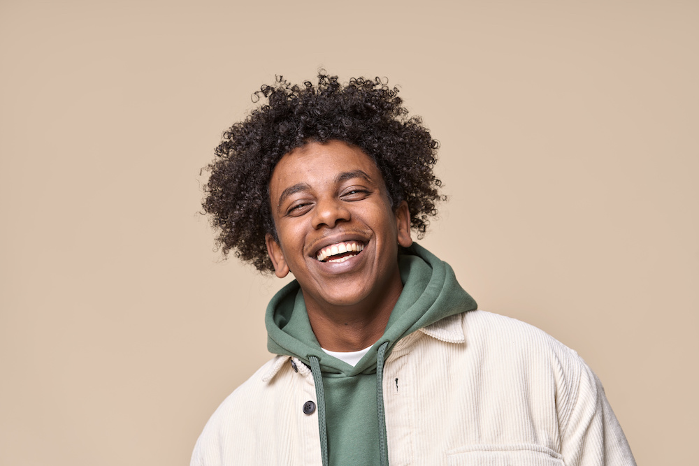 man smiling in a jacket